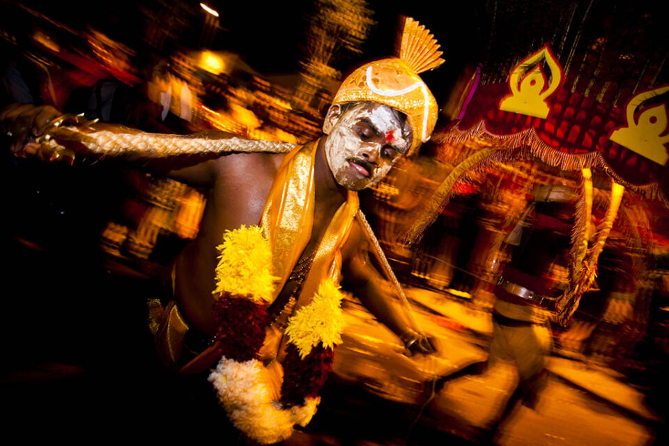 Entranced celebrant dancing in the morning