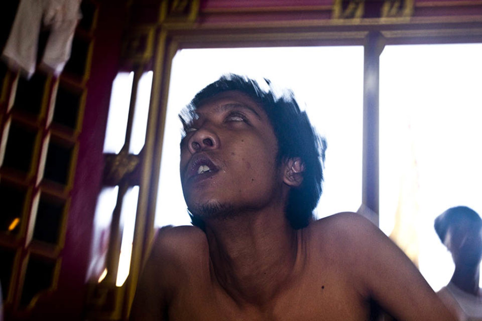 Ma-song's eyes roll-back as he enters a trance