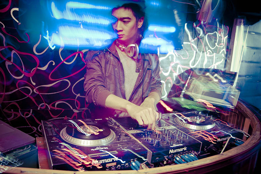 A dubstep DJ mixing at nightclub in Hanoi, Vietnam