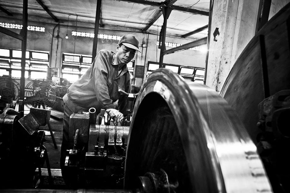 Worker repairing train wheels