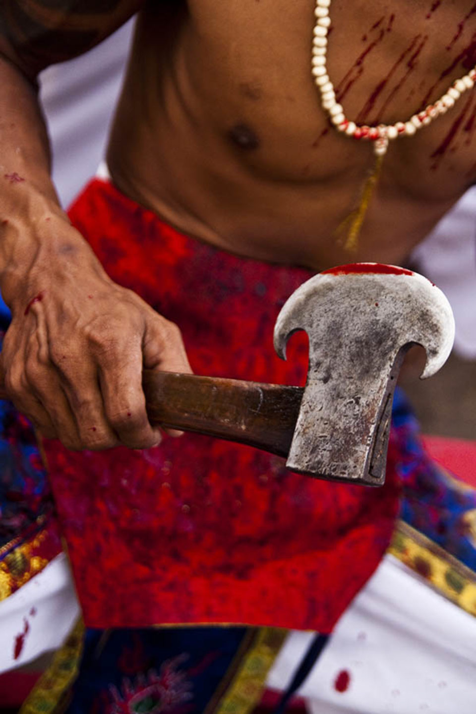 Blood from a ma-song's tongue on an axe