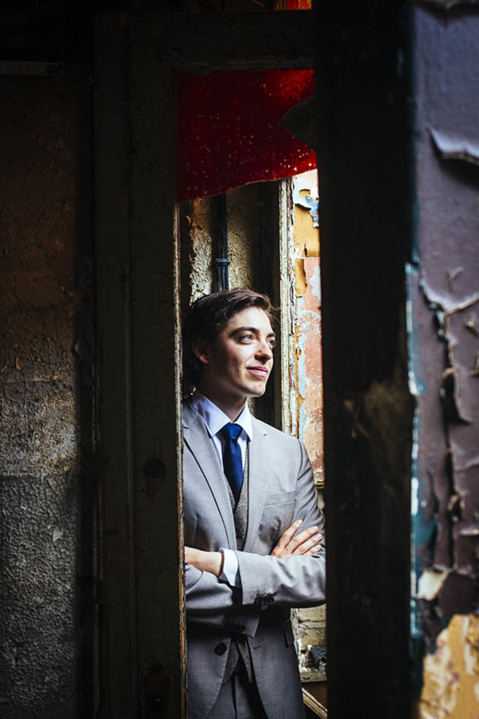 Man in an abandoned building by Montreal portrait photographer
