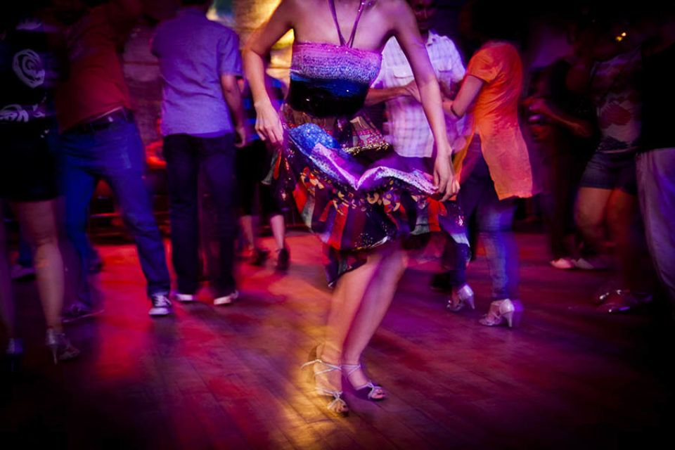 Young woman dancing salsa