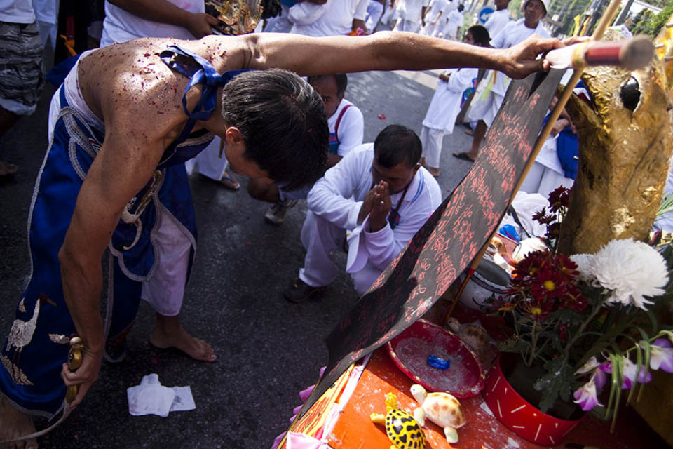Ma-song blessing a roadside shrine