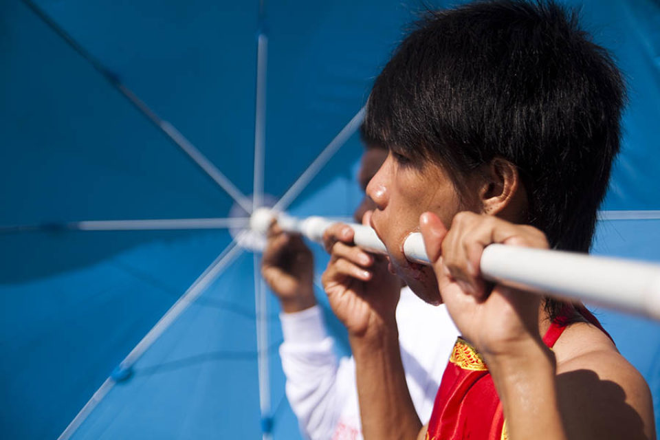 Ma-song pierced with parasol