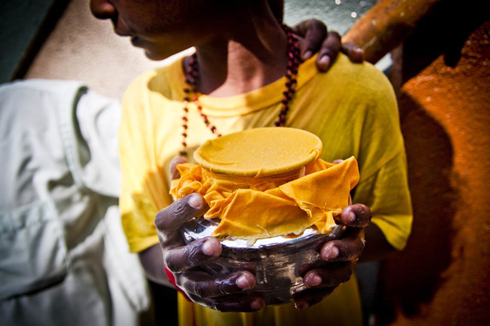 Young boy carrying kavadi