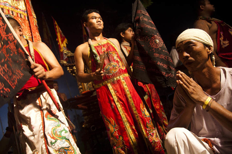 Festival celebrants pray at the end of the festival