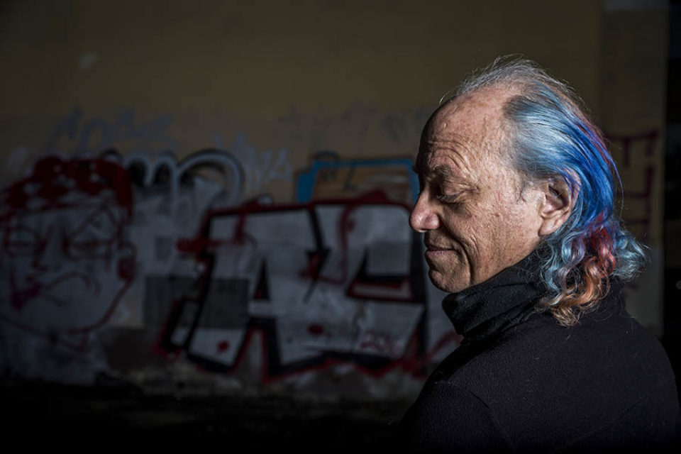 Editorial portrait of inventor Mitch Altman in the streets of Berlin, Germany