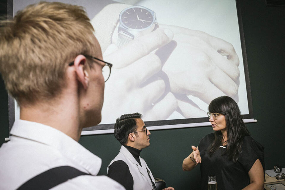 Attendees talk at corporate event shot by trusted Montreal photographer