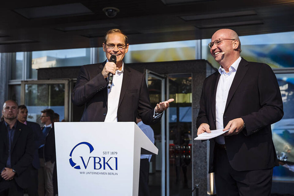 Mayor of Berlin and VBKI president during a corporate event