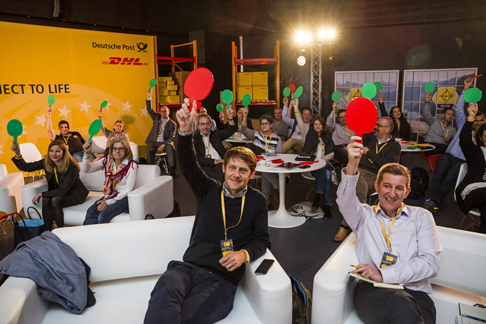 Montreal event photographer image of company conference attendees playing a game