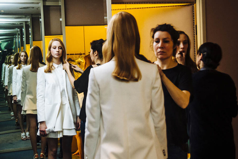 Model getting ready for fashion show by Montreal photographer