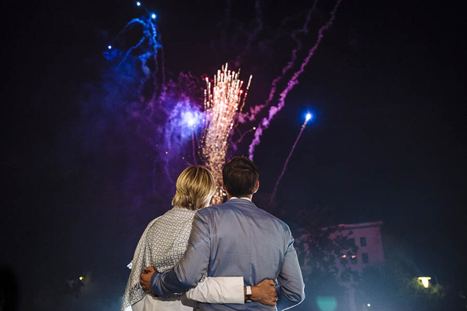 Montreal event photographer image of a couple watching fireworks during an event