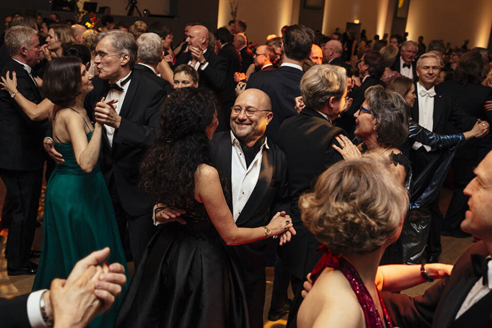 Attendees dance during a corporate ball