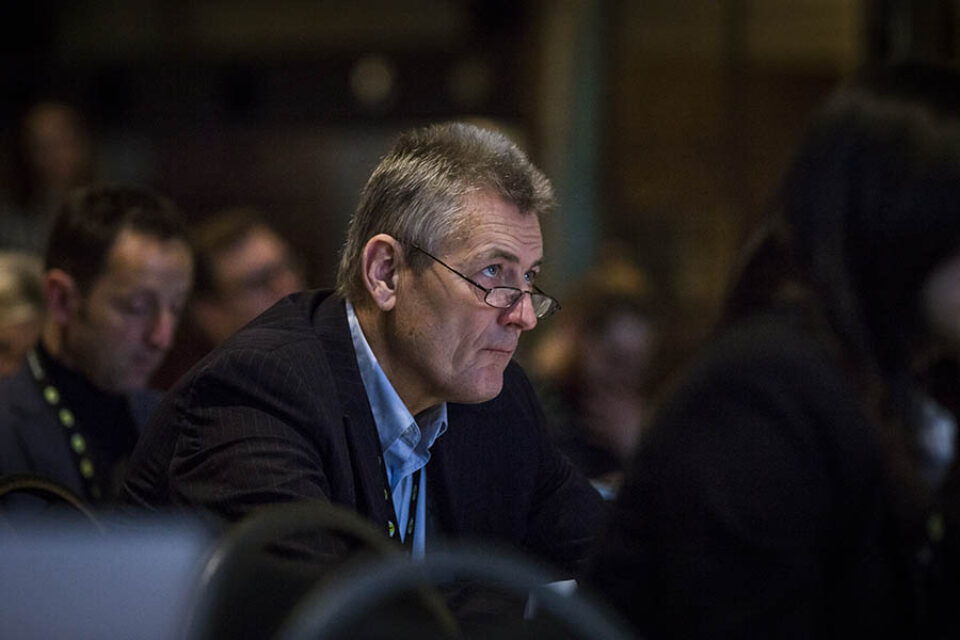 Man concentrating at event