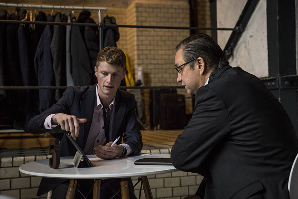 Business discussion at event