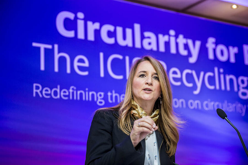 Presenter onstage at event