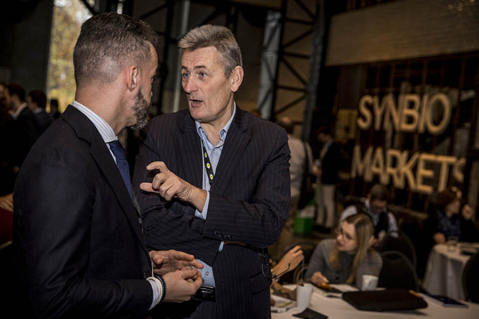 Discussing business at corporate event