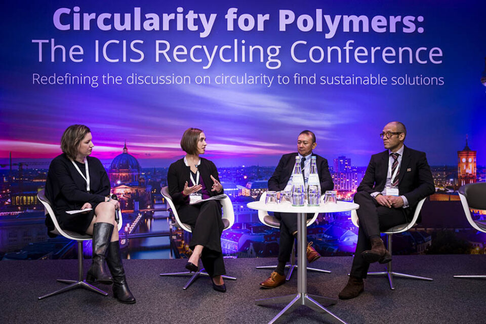 Event panelists onstage during corporate event