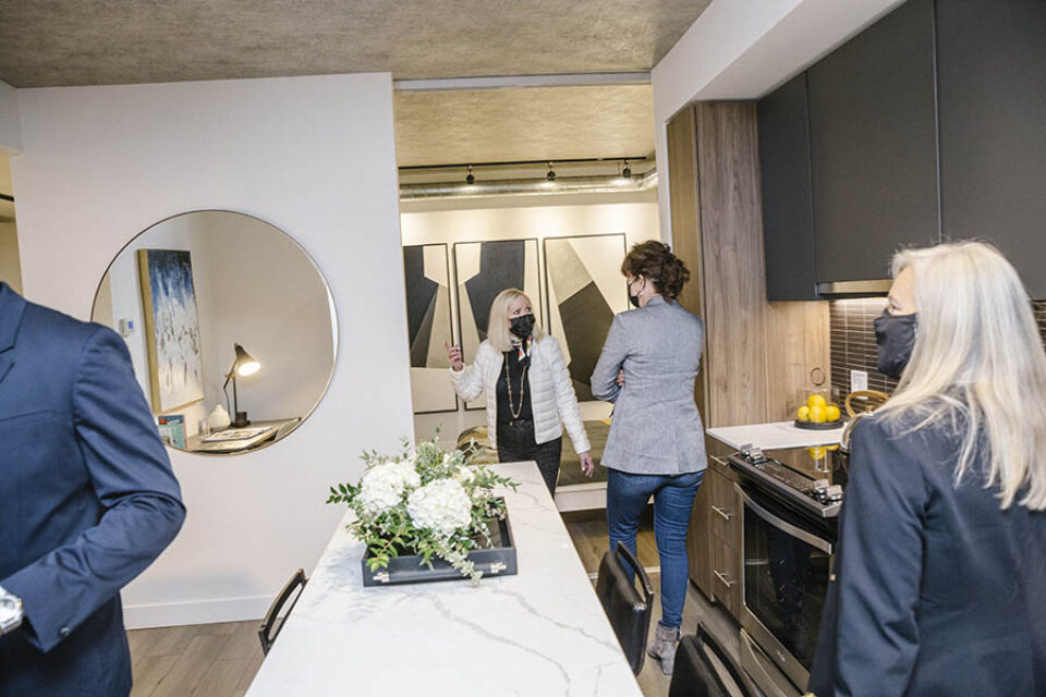 Visitors to model apartment at Ottawa real estate event