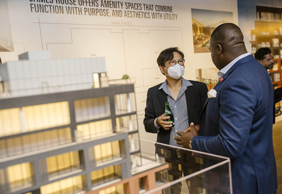 Real estate brokers chat at an event in Ottawa
