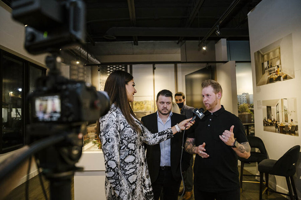 Clients being interviewed at Ottawa event