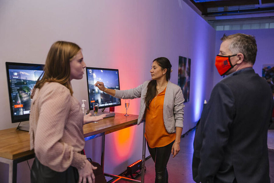 Guests by computer installation at Montreal event