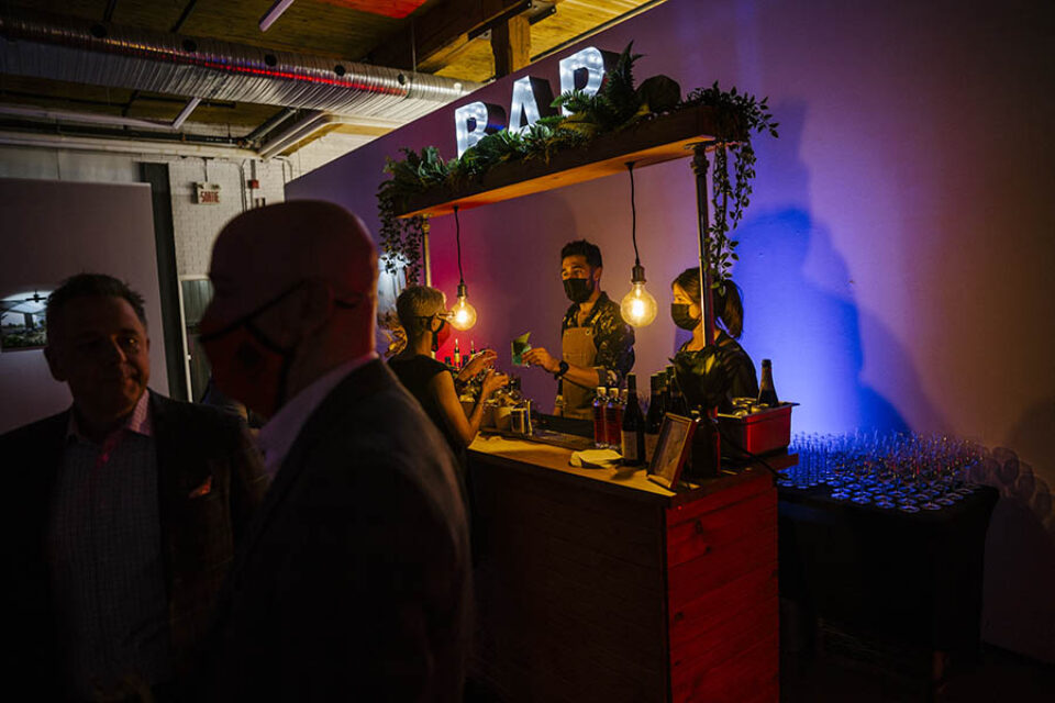 Barman serving Montreal event guest drink