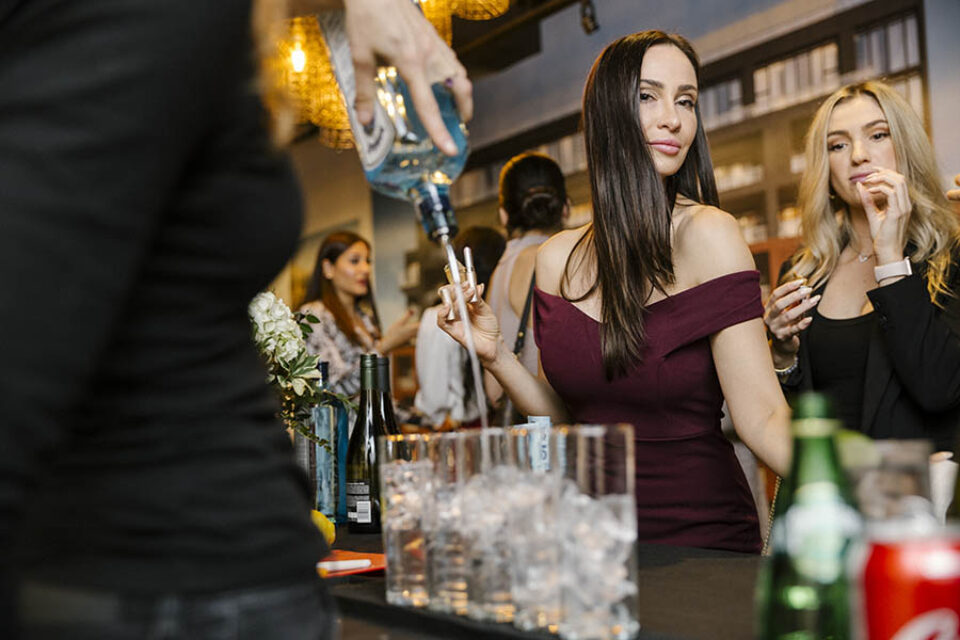 Woman at open bar at Ottawa event