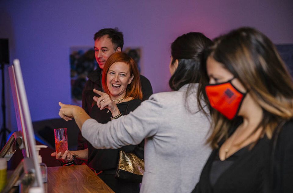 Montreal event guests share joke