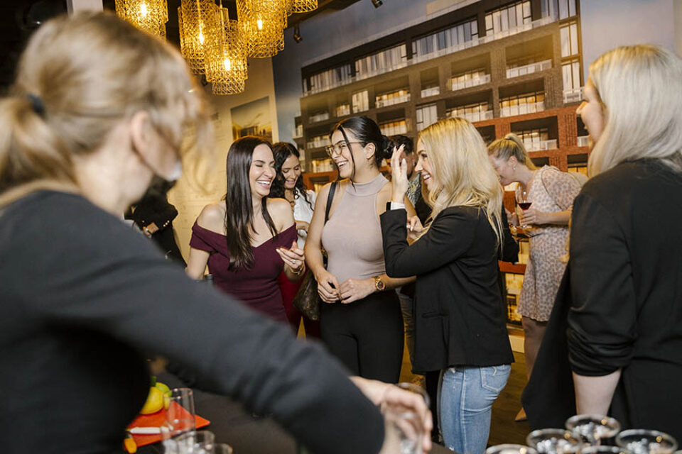 Women enjoying Ottawa real estate event