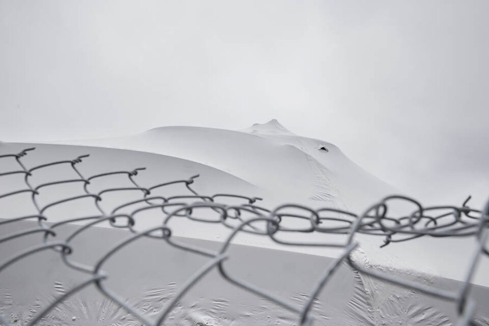 Winterized boat and fence