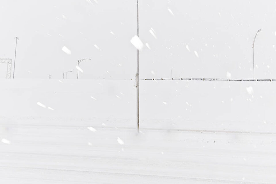 Streetlamps in snowstorm