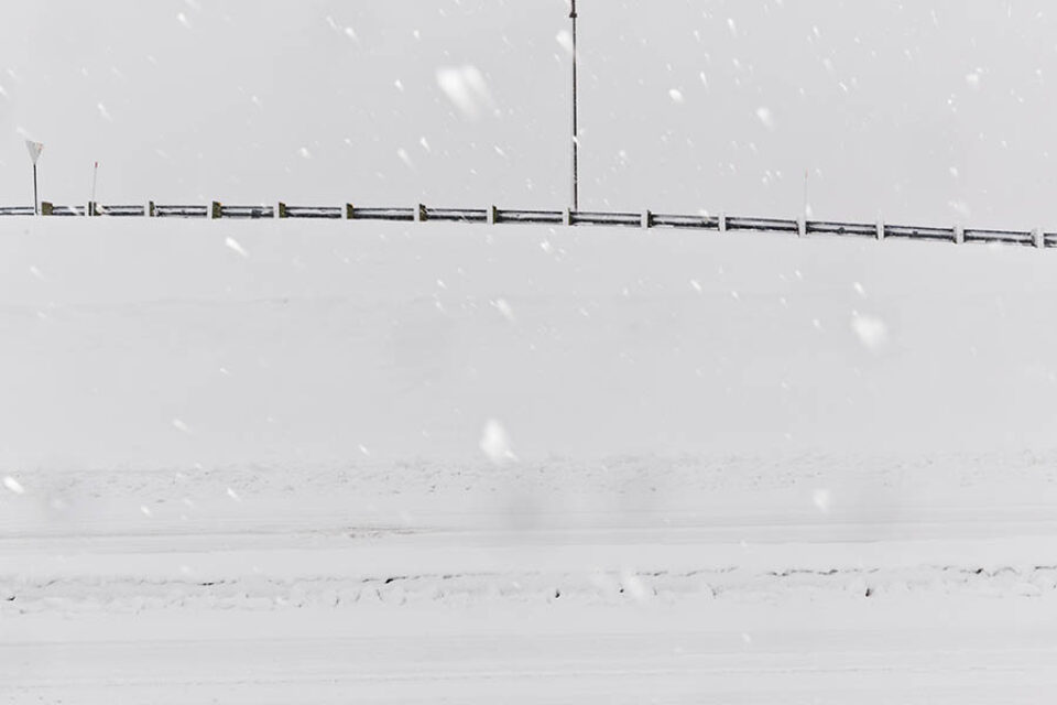 The urban landscape obscured by falling snow during the winter i