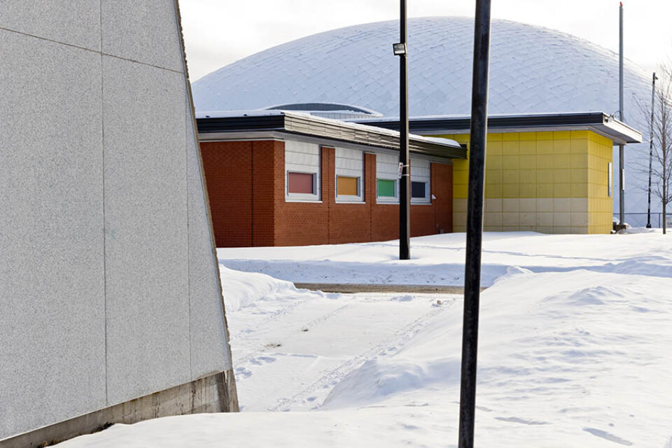 Colourful buildings in snow