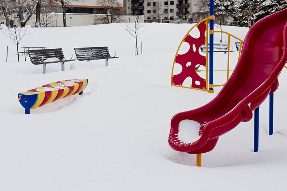 Playground covered in snow