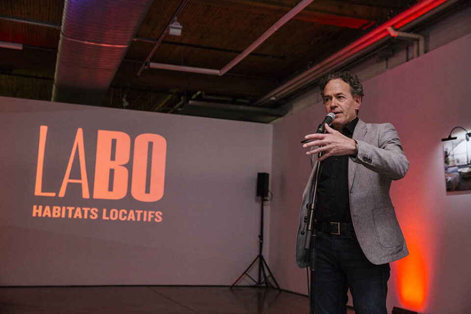 Man giving speech at real estate event