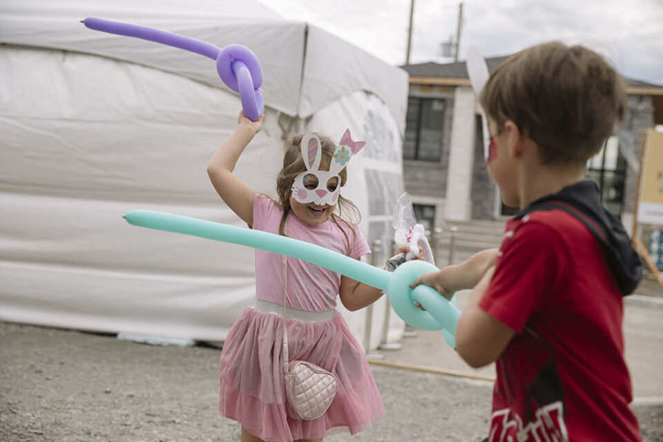Children fight with balloon swords