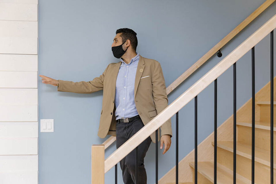 Broker demonstrating residence materials