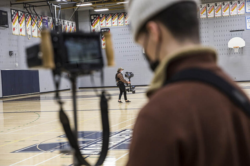 Filming in college gymnasium