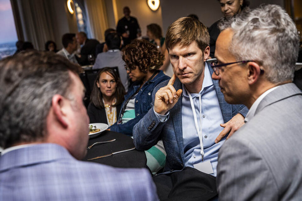 Delegates talk during gala dinner in Montreal