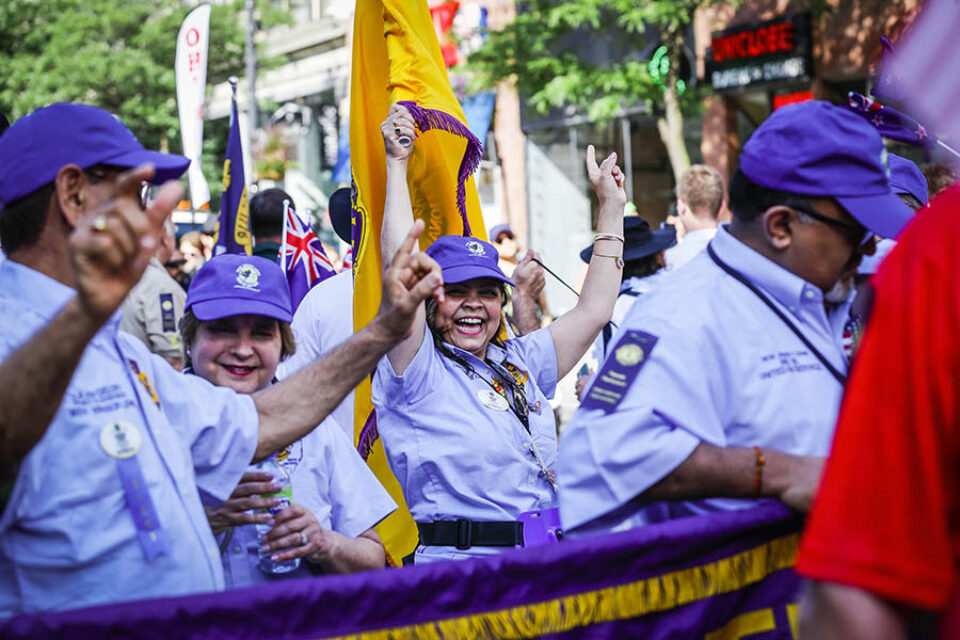 Cheering delegates at Montreal street parade