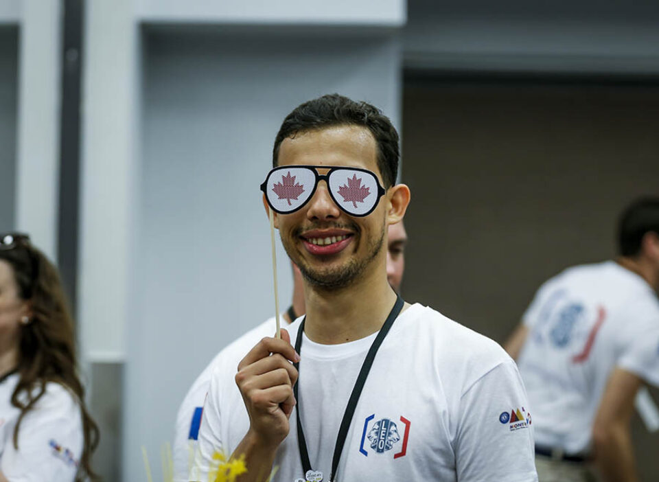 Montreal event photographer shot of young man with Canadian glasses
