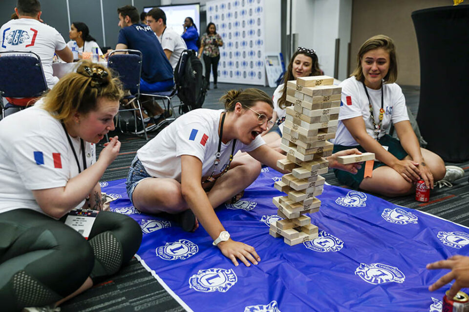 Jenga toppling during game at convention