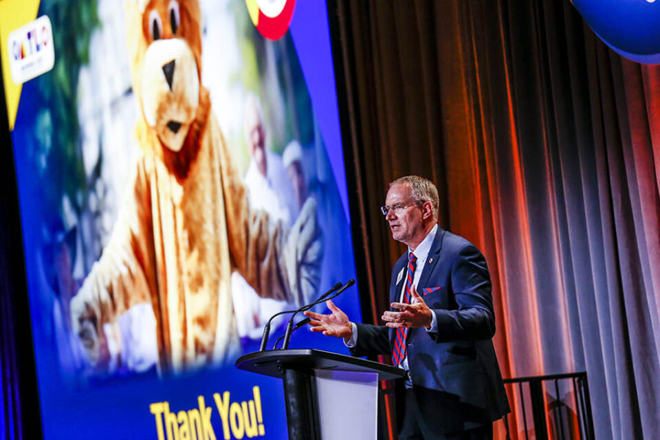 Presenter onstage at Montreal convention