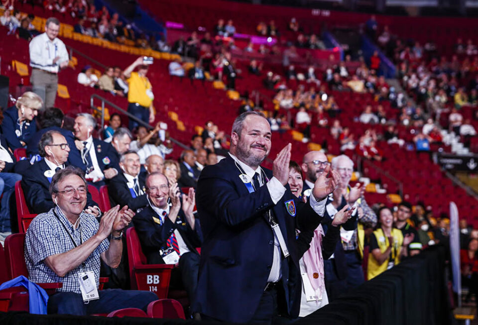 Convention delegates clapping