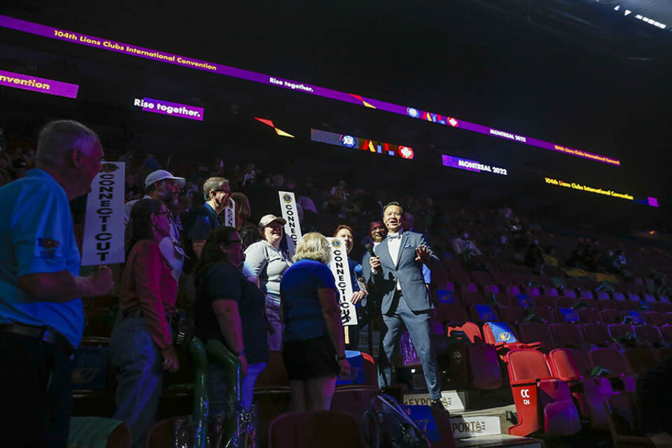 Montreal event photographer shot of delegates with convention presenter