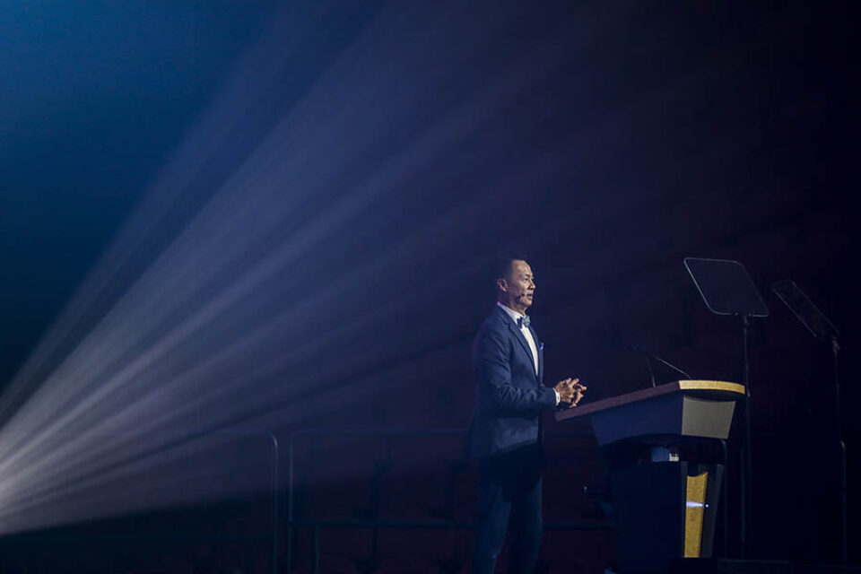 Presenter onstage at event in Montreal