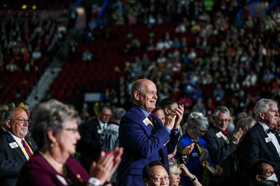 Delegate applauds at convention
