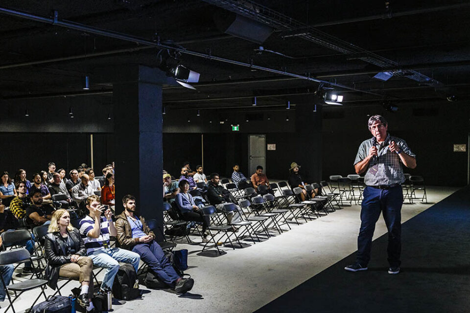Event presenter onstage, Montreal tech event photography